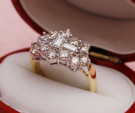 Solitaire diamond ring set in yellow gold from the Gold Reserves cabinet.